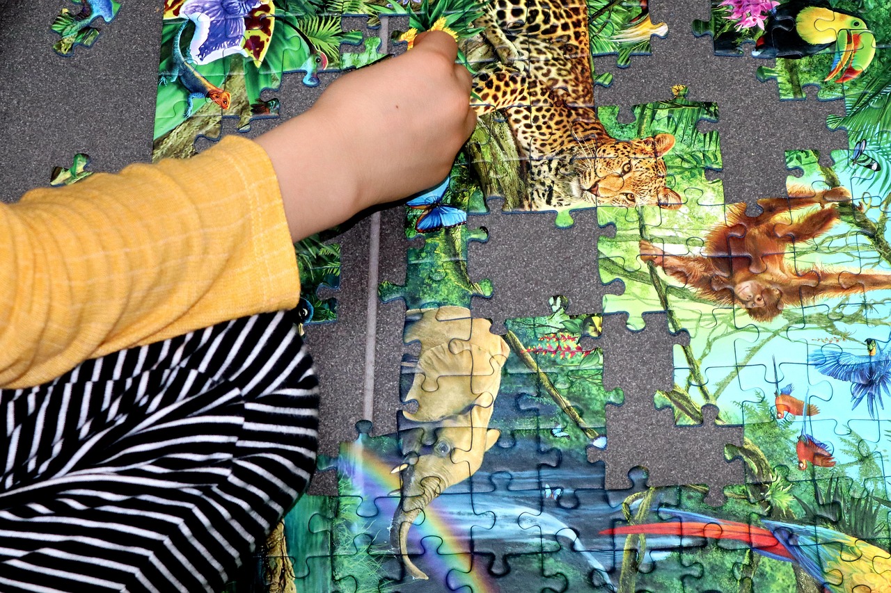 a kid playing with puzzles