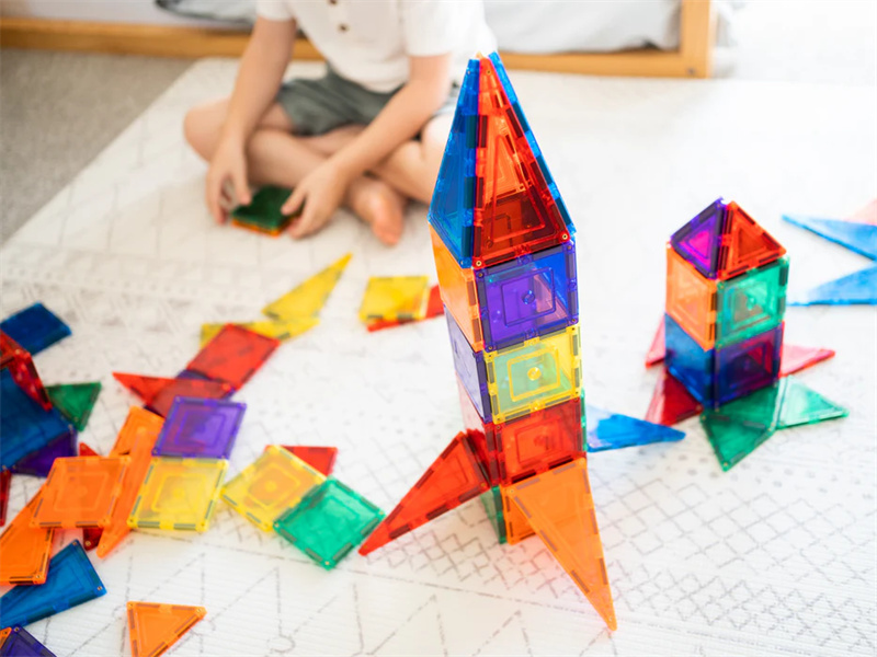 A 3D structure created with magnetic tiles, showing how they help develop spatial awareness and engineering skills.